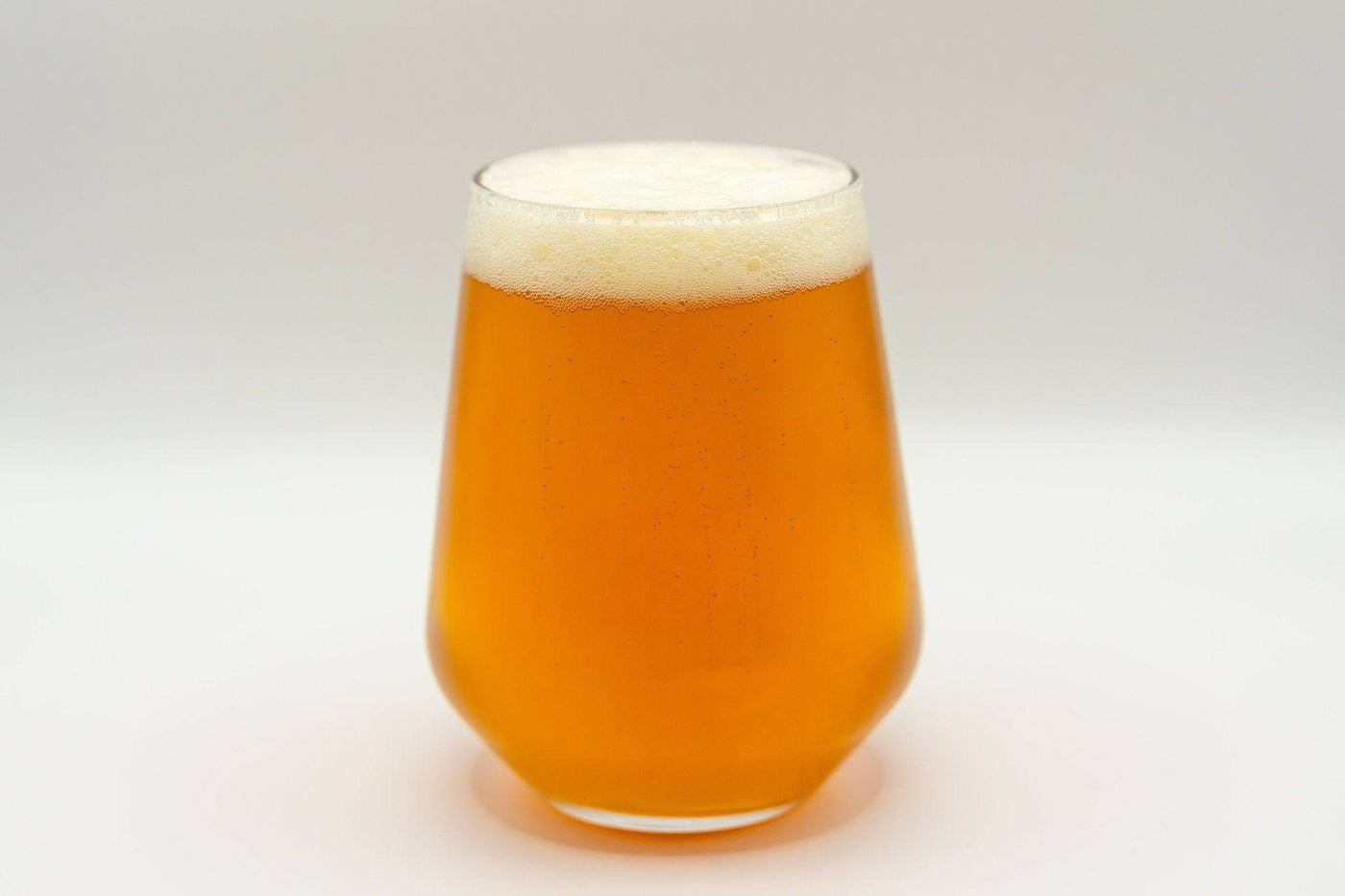 A freshly poured glass of Archetype Modern English IPA