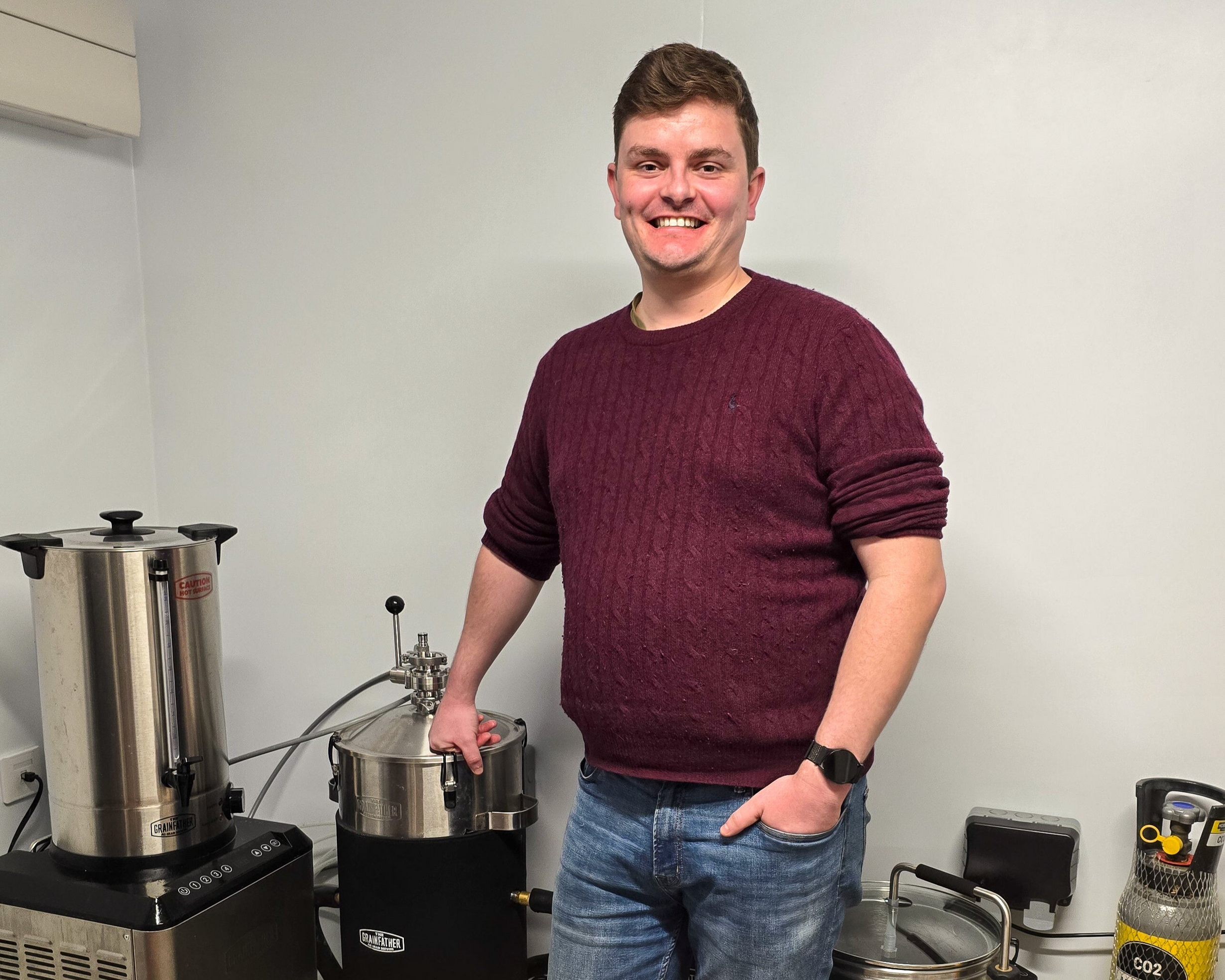Richard Alston, Founder of Tūn Brewing Co. by the pilot kit
